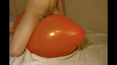 Twink Humping and Cumming on an Inflatable Orange Balloon