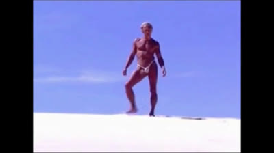 Beach Striptease: Tanned Hunk Bares All